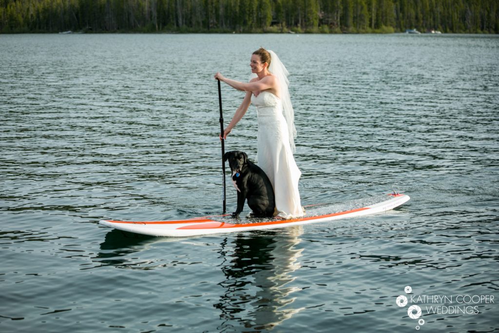 Adventure session Kathryn Cooper Weddings - Idaho SUP with dog in dress