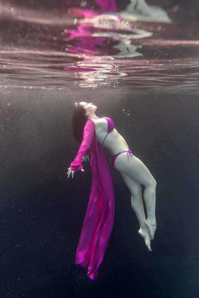 Sexy water boudoir photoshoot in a bikini